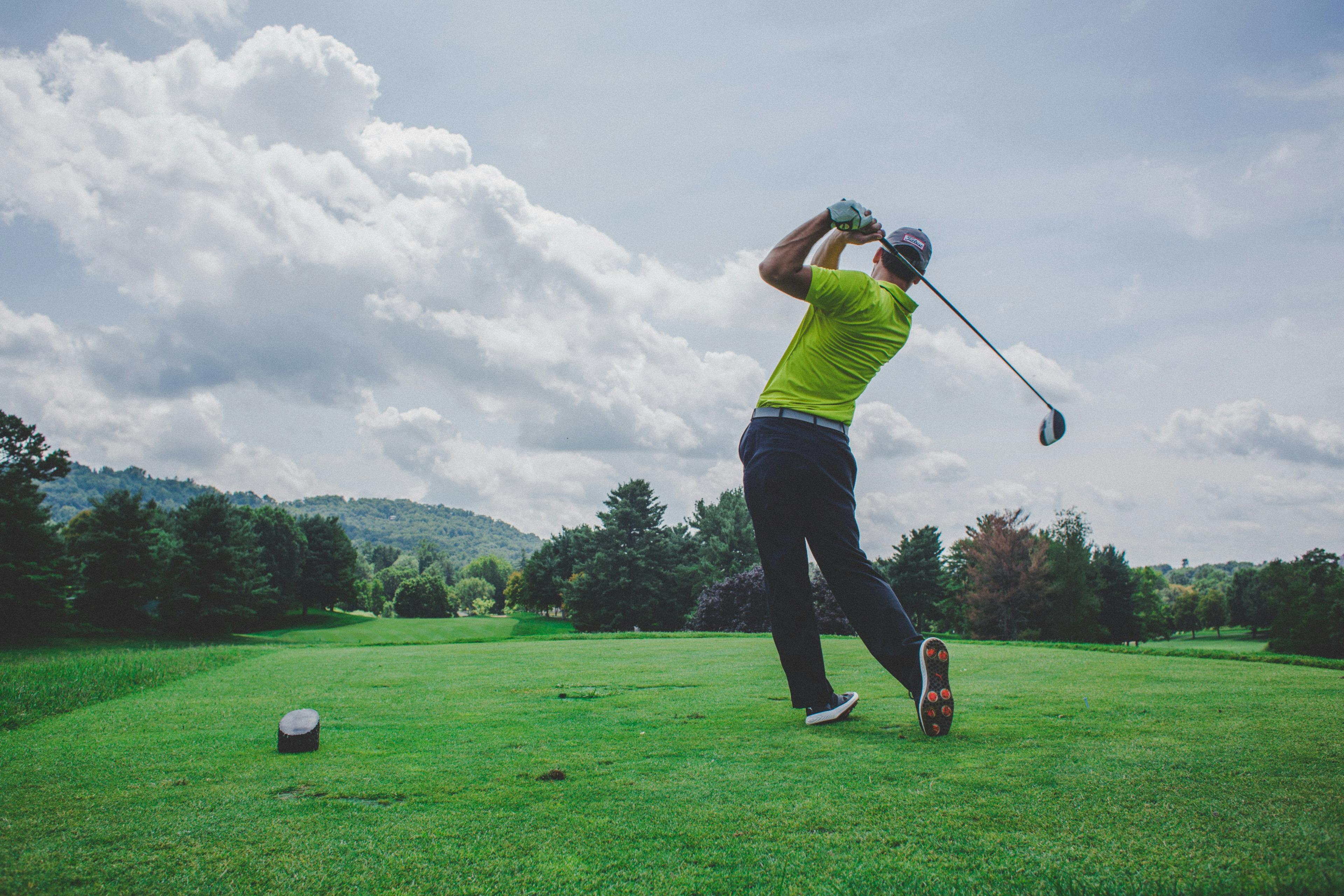 Golfer taking a drive